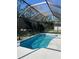 Inviting screened pool with a spacious deck at 4325 Renwick Dr, Parrish, FL 34219