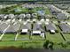 Community view showcasing homes with solar panels at 5429 Rainwood Meadows Dr, Apollo Beach, FL 33572