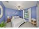 Serene bedroom with a calming blue wall at 5429 Rainwood Meadows Dr, Apollo Beach, FL 33572