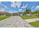 Single-Gathering home with paver driveway and landscaping at 5429 Rainwood Meadows Dr, Apollo Beach, FL 33572