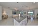 Modern kitchen with island and granite countertops at 5429 Rainwood Meadows Dr, Apollo Beach, FL 33572