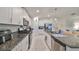 Modern kitchen with stainless steel appliances and granite counters at 5429 Rainwood Meadows Dr, Apollo Beach, FL 33572