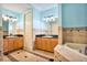 Double vanity bathroom with soaking tub and shower at 700 N Osceola Ave # 702, Clearwater, FL 33755