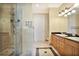 Bathroom with double vanity and walk-in shower at 700 N Osceola Ave # 702, Clearwater, FL 33755