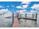 Private boat dock with lift and pathway at 700 N Osceola Ave # 702, Clearwater, FL 33755