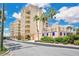 Attractive multi-story building with balconies and lush landscaping at 700 N Osceola Ave # 702, Clearwater, FL 33755