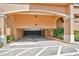 Secure parking garage entrance with designated parking spaces at 700 N Osceola Ave # 702, Clearwater, FL 33755