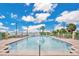 Inviting swimming pool with plenty of lounge chairs at 700 N Osceola Ave # 702, Clearwater, FL 33755