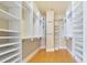 Large walk-in closet with ample shelving and hanging space at 700 N Osceola Ave # 702, Clearwater, FL 33755