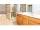 Bathroom boasts double sinks and a separate shower at 12820 Belvedere Song Way, Riverview, FL 33578