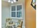 Cozy breakfast nook with glass table and window seat at 242 Shell Falls Dr, Apollo Beach, FL 33572