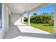 Bright and airy back patio, overlooking the backyard at 6179 Hidden Branch Dr, Apollo Beach, FL 33572