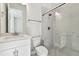 Bright bathroom with walk-in shower and white vanity at 6179 Hidden Branch Dr, Apollo Beach, FL 33572