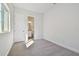 Well-lit bedroom with a private bathroom access at 6179 Hidden Branch Dr, Apollo Beach, FL 33572