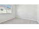 Bedroom with carpet and a window overlooking the street at 6179 Hidden Branch Dr, Apollo Beach, FL 33572