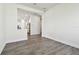 Dining area with kitchen views and wood-look floors at 6179 Hidden Branch Dr, Apollo Beach, FL 33572