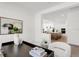 Home office with view into kitchen, offering an open floor plan at 6179 Hidden Branch Dr, Apollo Beach, FL 33572