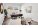 Spacious home office with wood floors and plenty of natural light at 6179 Hidden Branch Dr, Apollo Beach, FL 33572