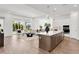 Open concept kitchen with island and stainless steel appliances at 6179 Hidden Branch Dr, Apollo Beach, FL 33572
