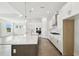 Modern kitchen with white cabinets and stainless steel appliances at 6179 Hidden Branch Dr, Apollo Beach, FL 33572