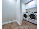 Laundry room with washer and dryer included at 9481 Highland Oak Dr # 306, Tampa, FL 33647