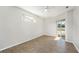 Bedroom with wood-look floors,sliding door to patio at 8929 Cashella Ct, Trinity, FL 34655