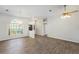 Bright and airy living room featuring hardwood floors and high ceilings at 8929 Cashella Ct, Trinity, FL 34655