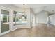 Living room with view of the pool through sliding glass doors at 8929 Cashella Ct, Trinity, FL 34655