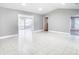 Bright living room with tile floors and access to backyard at 2229 Arch Mcdonald Dr, Dover, FL 33527