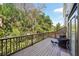 Expansive deck offering views of lush landscaping, creating a serene outdoor space perfect for entertaining or relaxation at 2947 Bayshore Pointe Dr, Tampa, FL 33611