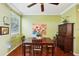 Cozy dining room features a classic dark wood table set and bright, natural light at 2947 Bayshore Pointe Dr, Tampa, FL 33611