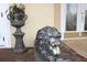 Bronze lion statue and urn add elegance to entryway at 5909 Menorca Ln, Apollo Beach, FL 33572