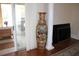 Large decorative vase in living room near sliding glass door at 5909 Menorca Ln, Apollo Beach, FL 33572