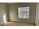 Bedroom with a window with sunlight coming in at 8504 Brushleaf Way, Tampa, FL 33647