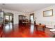 Dining room with hardwood floors and a wooden dining set at 4224 Fleewell Ct, Valrico, FL 33596