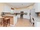 Kitchen with white cabinets, granite countertops, and stainless steel appliances at 4224 Fleewell Ct, Valrico, FL 33596