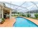 Inviting pool and spa with screened enclosure and patio area at 4224 Fleewell Ct, Valrico, FL 33596