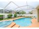 Inviting pool area with spa and screened enclosure at 4224 Fleewell Ct, Valrico, FL 33596