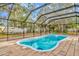 Relaxing screened pool with surrounding patio at 1111 67Th Nw St, Bradenton, FL 34209