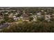 Aerial view of homes and street in a residential area at 2944 Prairie Iris Dr, Land O Lakes, FL 34638