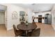 Kitchen dining area with a round table and four chairs at 2944 Prairie Iris Dr, Land O Lakes, FL 34638