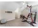 Home gym with a multi-functional fitness machine at 2944 Prairie Iris Dr, Land O Lakes, FL 34638