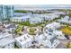 Aerial view of waterfront community with shops and apartments at 5310 Escena Ct, Tampa, FL 33611