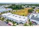 Aerial view of commercial property with adjacent open land at 5310 Escena Ct, Tampa, FL 33611