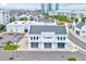 Aerial view of commercial building with ample parking at 5310 Escena Ct, Tampa, FL 33611