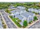 Aerial view of townhome community and neighborhood at 5310 Escena Ct, Tampa, FL 33611