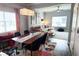 Bright dining room features a wood table, blue chairs, and an area rug at 5310 Escena Ct, Tampa, FL 33611