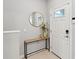 Modern entryway with a console table and mirror at 5310 Escena Ct, Tampa, FL 33611