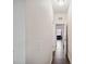 Bright hallway with wood flooring and access to other rooms at 5310 Escena Ct, Tampa, FL 33611