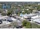 Aerial view of downtown area featuring local shops, restaurants, and businesses, and a lake in the background at 541 E Lime St, Tarpon Springs, FL 34689